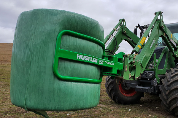 Hustler | Attachments & Bale Handlers | Softhands Bale Handlers for sale at FoxFire Feed LLC.